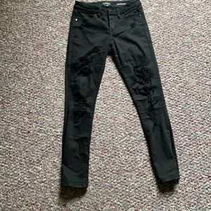 Cropped mid rise black ripped jeans